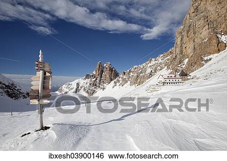 "Signpost, Tierser Alplhutte mountain cabin and Rosszahne peaks in winter, Seiser Alm alp, Province of South Tyrol, Italy, Europe" View Large Photo Image Stock Photograph - "Signpost, Tierser Alplhutte mountain cabin and Rosszahne peaks in winter, Seiser Alm alp, Province of South Tyrol, Italy, Europe". Fotosearch