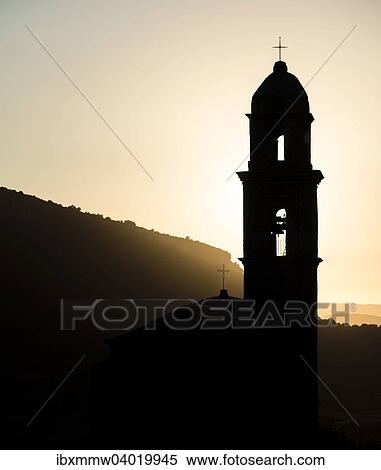 Stock Photography - "Silhouette of a church tower, evening mood, Haute-Corse, Corsica, France, Europe". Fotosearch