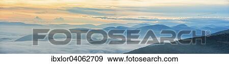 "Silhouette of mountains at sunrise with clouds and fog, Apennines, Umbria, Italy, Europe" View Large Photo Image Stock Photo - "Silhouette of mountains at sunrise with clouds and fog, Apennines, Umbria, Italy, Europe". Fotosearch