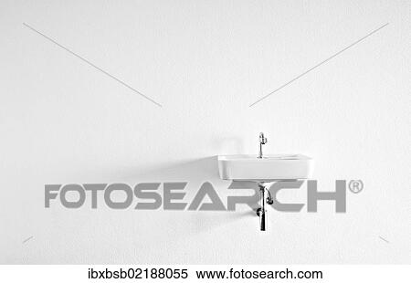 Sink on the wall in an empty room View Large Photo Image Stock Photography - Sink on the wall in an empty room. Fotosearch