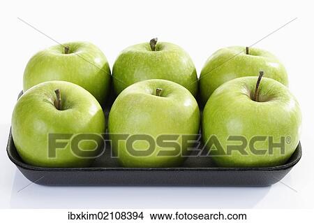 "Six green apples on a plastic tray, Granny Smith cultivar" View Large Photo Image Picture - "Six green apples on a plastic tray, Granny Smith cultivar". Fotosearch
