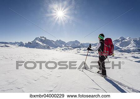 "Ski mountaineer during the ascent of Mt Seekofel in the Fanes-Sennes-Prags Nature Park in the Dolomites, at the back the mountains Kleine Gaisl, Hohe Gaisel and Monte Cristallo, St. Vigil, Puster Valley, South Tyrol, Italy, Europe" View Large Photo Image Stock Photo - "Ski mountaineer during the ascent of Mt Seekofel in the Fanes-Sennes-Prags Nature Park in the Dolomites, at the back the mountains Kleine Gaisl, Hohe Gaisel and Monte Cristallo, St. Vigil, Puster Valley, South Tyrol, Italy, Europe". Fotosearch
