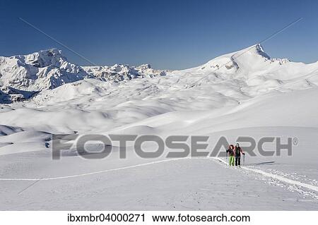 "Ski mountaineers during the ascent of Mt Seekofel in the Fanes-Sennes-Prags Nature Park of the Dolomites, Mt Neuner at the back, Mt Seneser Karspitze on the right, St. Vigil, Puster Valley, South Tyrol, Italy, Europe" View Large Photo Image Stock Image - "Ski mountaineers during the ascent of Mt Seekofel in the Fanes-Sennes-Prags Nature Park of the Dolomites, Mt Neuner at the back, Mt Seneser Karspitze on the right, St. Vigil, Puster Valley, South Tyrol, Italy, Europe". Fotosearch