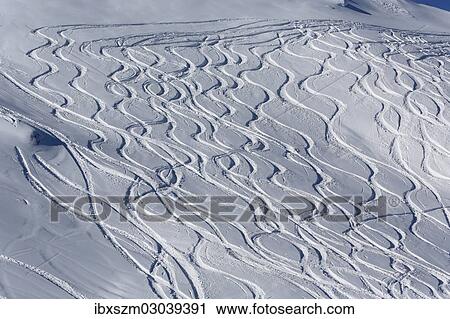Stock Image - "Ski tracks in deep snow, Flumserberg, Flums, Canton of St. Gallen, Switzerland, Europe". Fotosearch