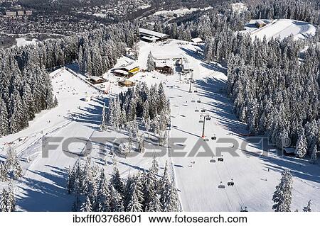 "Skiers on Hausberg Mountain, winter landscape, Garmisch-Partenkirchen, Bavaria, Germany, Europe" View Large Photo Image Stock Image - "Skiers on Hausberg Mountain, winter landscape, Garmisch-Partenkirchen, Bavaria, Germany, Europe". Fotosearch