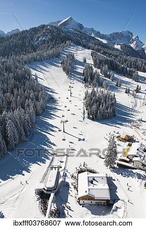 Stock Photo - "Skiers on Hausberg Mountain, winter landscape, Garmisch-Partenkirchen, Bavaria, Germany, Europe". Fotosearch