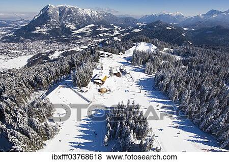 "Skiers on Hausberg Mountain, winter landscape, Garmisch-Partenkirchen, Bavaria, Germany, Europe" View Large Photo Image Stock Photo - "Skiers on Hausberg Mountain, winter landscape, Garmisch-Partenkirchen, Bavaria, Germany, Europe". Fotosearch