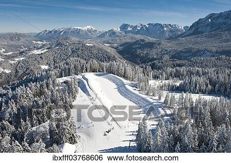 "Skiers on Hausberg Mountain, winter landscape, Garmisch-Partenkirchen, Bavaria, Germany, Europe" View Large Photo Image Stock Photograph - "Skiers on Hausberg Mountain, winter landscape, Garmisch-Partenkirchen, Bavaria, Germany, Europe". Fotosearch