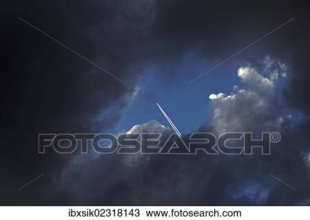 "Sky, clouds, contrails" View Large Photo Image Stock Image - "Sky, clouds, contrails". Fotosearch
