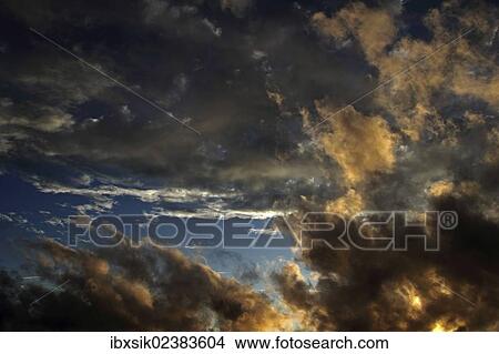"Sky with clouds, moody atmosphere" View Large Photo Image Picture - "Sky with clouds, moody atmosphere". Fotosearch
