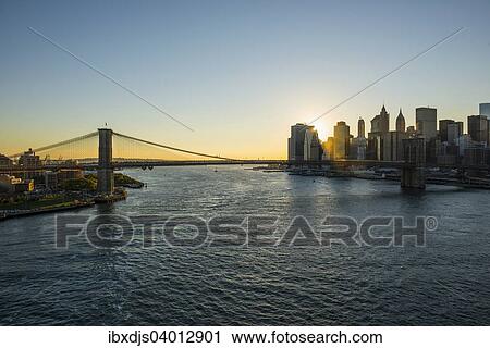 "Skyline and Brooklyn Bridge, sunset, Downtown, Manhattan, New York, United States, North America" View Large Photo Image Stock Image - "Skyline and Brooklyn Bridge, sunset, Downtown, Manhattan, New York, United States, North America". Fotosearch