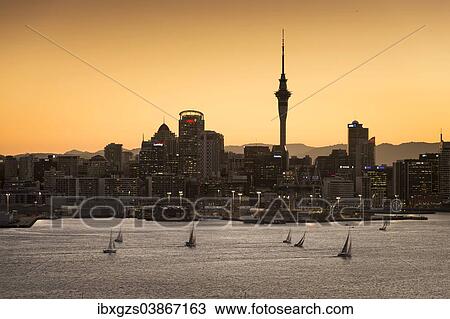 "Skyline of Auckland with the Sky Tower at dusk, Auckland, North Island, New Zealand, Oceania" View Large Photo Image Stock Image - "Skyline of Auckland with the Sky Tower at dusk, Auckland, North Island, New Zealand, Oceania". Fotosearch