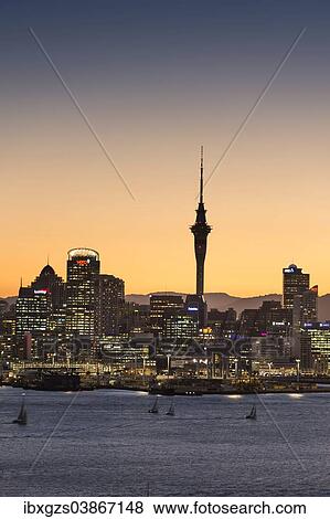 "Skyline of Auckland with the Sky Tower at dusk, Auckland, North Island, New Zealand, Oceania" View Large Photo Image Stock Photo - "Skyline of Auckland with the Sky Tower at dusk, Auckland, North Island, New Zealand, Oceania". Fotosearch