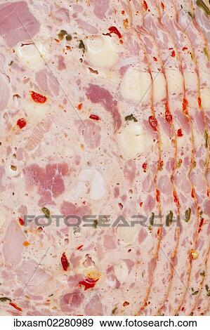 "Slices of Leberkaese, """"liver cheese"""", meat loaf with cheese, peppers and fresh herbs, German and Austrian cuisine" View Large Photo Image Stock Photo - "Slices of Leberkaese, """"liver cheese"""", meat loaf with cheese, peppers and fresh herbs, German and Austrian cuisine". Fotosearch