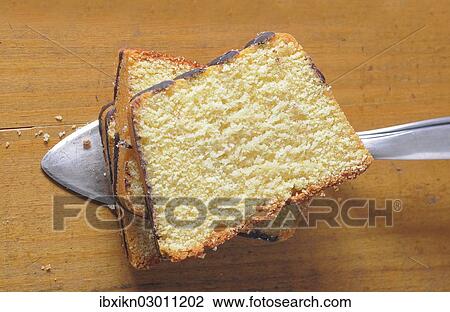 Stock Image - Slices of ring cake. Fotosearch