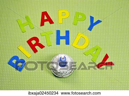 Small birthday cake and the words Happy Birthday View Large Photo Image Picture - Small birthday cake and the words Happy Birthday. Fotosearch