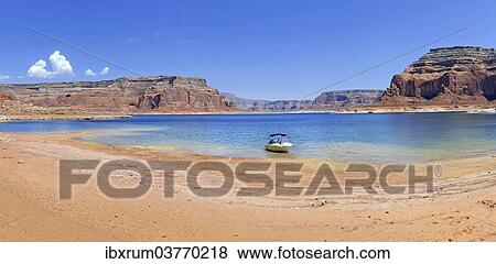 Stock Photo - "Small boat on the shore of Lake Powell, Page, Arizona, USA". Fotosearch