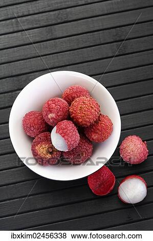 Small bowl of Lychees (Litchi chinensis) View Large Photo Image Stock Photo - Small bowl of Lychees (Litchi chinensis). Fotosearch
