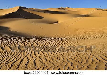 Stock Image - "Small erg or sand dunes near Tehenadou, Adrar n'Ahnet, Adrar Ahnet, Algeria, Sahara, North Africa, Africa". Fotosearch