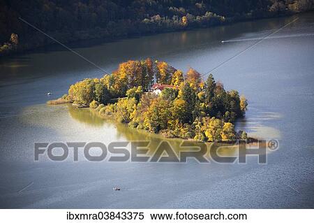 "Small island in Schliersee lake in autumn, Schliersee, Upper Bavaria, Bavaria, Germany, Europe" View Large Photo Image Stock Photography - "Small island in Schliersee lake in autumn, Schliersee, Upper Bavaria, Bavaria, Germany, Europe". Fotosearch