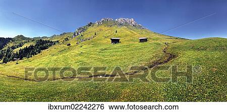 "Small spring at Mt Peitlerkofel, Sasso delle Putia, with mountain hut, Villnoess, Funes, Dolomites, South Tyrol, Italy, Europe" View Large Photo Image Stock Photograph - "Small spring at Mt Peitlerkofel, Sasso delle Putia, with mountain hut, Villnoess, Funes, Dolomites, South Tyrol, Italy, Europe". Fotosearch