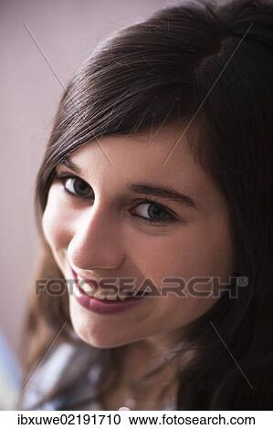 "Smiling girl with long hair, portrait" View Large Photo Image Stock Image - "Smiling girl with long hair, portrait". Fotosearch