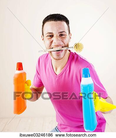"Smiling man with a cleaning brush between his teeth, Mannheim, Baden-Wurttemberg, Germany, Europe" View Large Photo Image Stock Photograph - "Smiling man with a cleaning brush between his teeth, Mannheim, Baden-Wurttemberg, Germany, Europe". Fotosearch