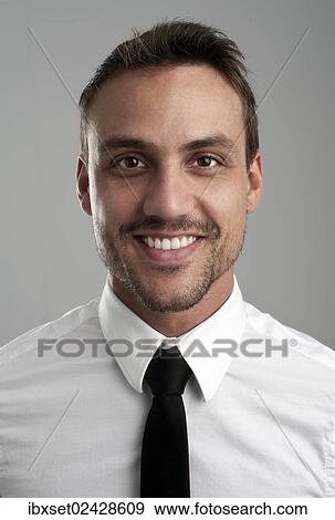 "Smiling young man wearing a shirt and a tie, portrait" View Large Photo Image Stock Photo - "Smiling young man wearing a shirt and a tie, portrait". Fotosearch