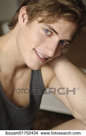 "Smiling young man wearing underwear, portrait" View Large Photo Image Picture - "Smiling young man wearing underwear, portrait". Fotosearch