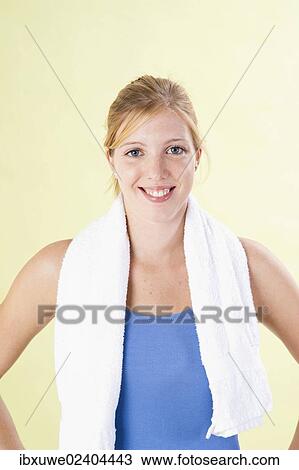 Smiling young woman after doing sport View Large Photo Image Stock Image - Smiling young woman after doing sport. Fotosearch