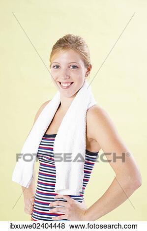 Smiling young woman after doing sport View Large Photo Image Stock Photo - Smiling young woman after doing sport. Fotosearch