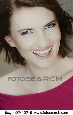 Stock Photography - "Smiling young woman, portrait". Fotosearch