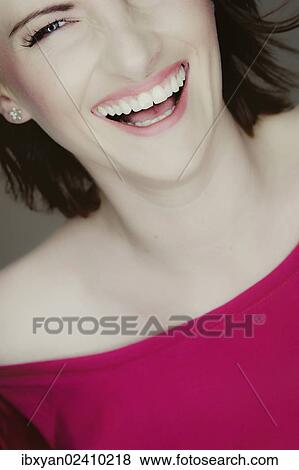 Stock Photo - Smiling young woman. Fotosearch