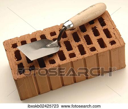 Smoothing trowel on a red brick View Large Photo Image Stock Image - Smoothing trowel on a red brick. Fotosearch