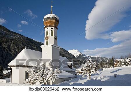 Stock Image - "Snow-covered church, St Gallenkirch, Montafon, Vorarlberg, Austria, Europe". Fotosearch