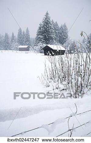 Stock Photo - "Snow-covered log cabin, Garmisch-Partenkirchen, Bavaria, Germany, Europe". Fotosearch