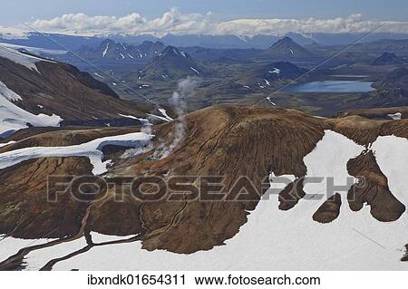 Stock Image - "Snow-covered smoking crater in a volcanic landscape, Eyjafjallajoekull, Iceland, Europe". Fotosearch