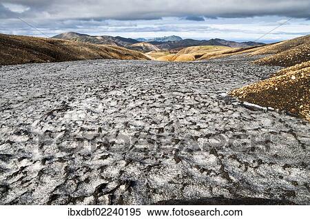 "Snow field colored black from ashes, rhyolite mountains, Landmannalaugar, Fjallabak Nature Reserve, Highlands of Iceland, Iceland, Europe" View Large Photo Image Stock Photography - "Snow field colored black from ashes, rhyolite mountains, Landmannalaugar, Fjallabak Nature Reserve, Highlands of Iceland, Iceland, Europe". Fotosearch