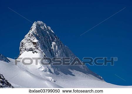 Stock Image - "Snow on Crast Aguzza, Pontresina, Graubunden, Switzerland, Europe". Fotosearch