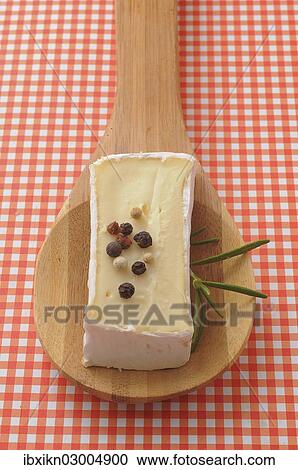 "Soft cheese on a wooden spoon, Germany, Europe" View Large Photo Image Stock Image - "Soft cheese on a wooden spoon, Germany, Europe". Fotosearch