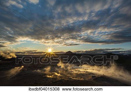 "Solfataras, fumaroles, mud pots, sulfur and other minerals, vapor lights in the setting sun on the mountain Namafjall, high-temperature area or Hverarond, North Eastern Region, Iceland, Europe" View Large Photo Image Stock Photo - "Solfataras, fumaroles, mud pots, sulfur and other minerals, vapor lights in the setting sun on the mountain Namafjall, high-temperature area or Hverarond, North Eastern Region, Iceland, Europe". Fotosearch