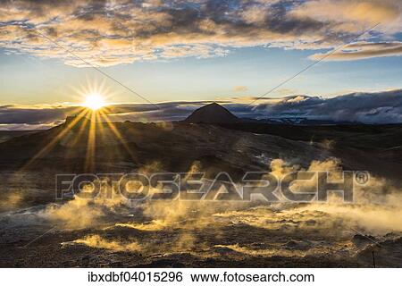 "Solfataras, fumaroles, mud pots, sulfur and other minerals, vapor lights in the setting sun on the mountain Namafjall, high-temperature area or Hverarond, North Eastern Region, Iceland, Europe" View Large Photo Image Stock Photograph - "Solfataras, fumaroles, mud pots, sulfur and other minerals, vapor lights in the setting sun on the mountain Namafjall, high-temperature area or Hverarond, North Eastern Region, Iceland, Europe". Fotosearch