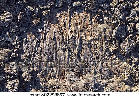 "Solidified lava patches between volcanic rocks, spatter cones, Craters of the Moon National Monument, Arco, Highway 20, Idaho, USA" View Large Photo Image Stock Photo - "Solidified lava patches between volcanic rocks, spatter cones, Craters of the Moon National Monument, Arco, Highway 20, Idaho, USA". Fotosearch