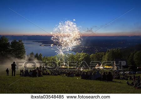 Stock Photography - "Solstice celebrations with fireworks on Mt Pfaender, Lake Constance at back, near Bregenz, Vorarlberg, Austria, Europe". Fotosearch
