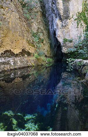 Stock Photo - "Source, karst spring Sorgente Su Gologone in Oliena, Province of Nuoro, Sardinia, Italy, Europe". Fotosearch