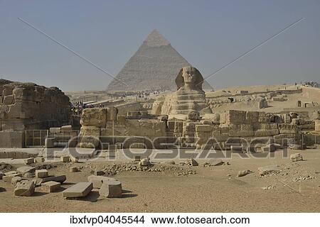 Picture - "Sphinx or Great Sphinx of Giza, lion with a human head, built in the 4th Egyptian dynasty around 2700 BC, in front of the Pyramid of Chephren, Giza, Egypt, Africa". Fotosearch