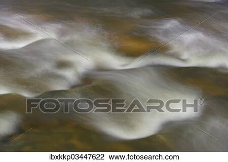 "Spray and waves, water flowing through cascades and stones in the river bed of the Ilse River, Ilsenburg, Saxony-Anhalt, Germany, Europe" View Large Photo Image Stock Image - "Spray and waves, water flowing through cascades and stones in the river bed of the Ilse River, Ilsenburg, Saxony-Anhalt, Germany, Europe". Fotosearch