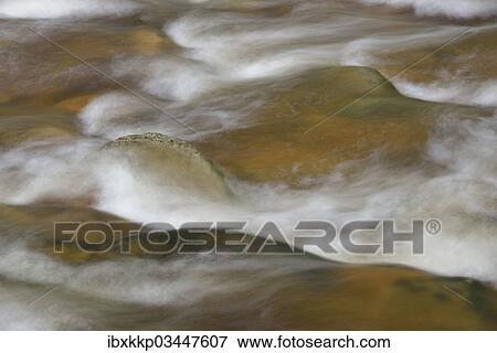 "Spray and waves, water flowing through cascades and stones in the river bed of the Ilse River, Ilsenburg, Saxony-Anhalt, Germany, Europe" View Large Photo Image Stock Photo - "Spray and waves, water flowing through cascades and stones in the river bed of the Ilse River, Ilsenburg, Saxony-Anhalt, Germany, Europe". Fotosearch