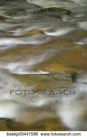 "Spray and waves, water flowing through cascades and stones in the river bed of the Ilse River, Ilsenburg, Saxony-Anhalt, Germany, Europe" View Large Photo Image Stock Photograph - "Spray and waves, water flowing through cascades and stones in the river bed of the Ilse River, Ilsenburg, Saxony-Anhalt, Germany, Europe". Fotosearch