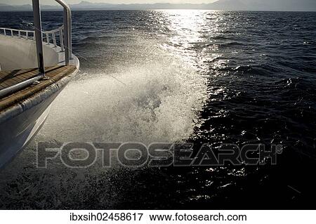 "Spray wafting, diving boat in the evening sun, Red Sea, Hurghada, Egypt, Africa" View Large Photo Image Stock Photo - "Spray wafting, diving boat in the evening sun, Red Sea, Hurghada, Egypt, Africa". Fotosearch